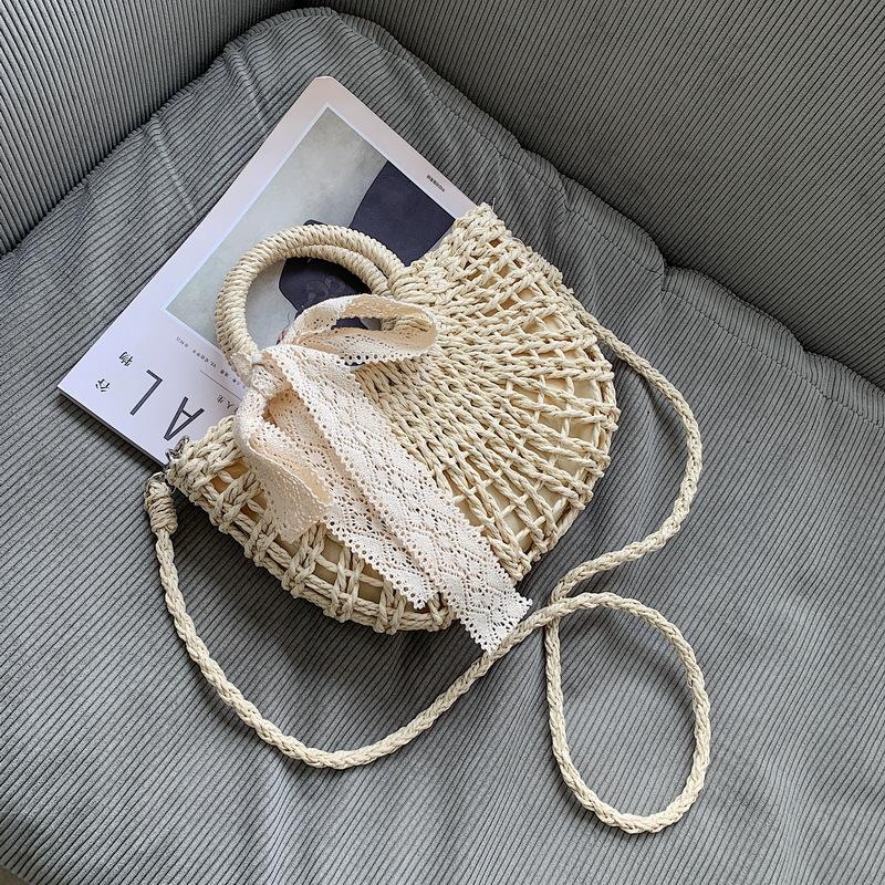 Straw bag women's niche 2025 new shoulder messenger women's bag versatile autumn and winter beach bag portable vegetable basket bag