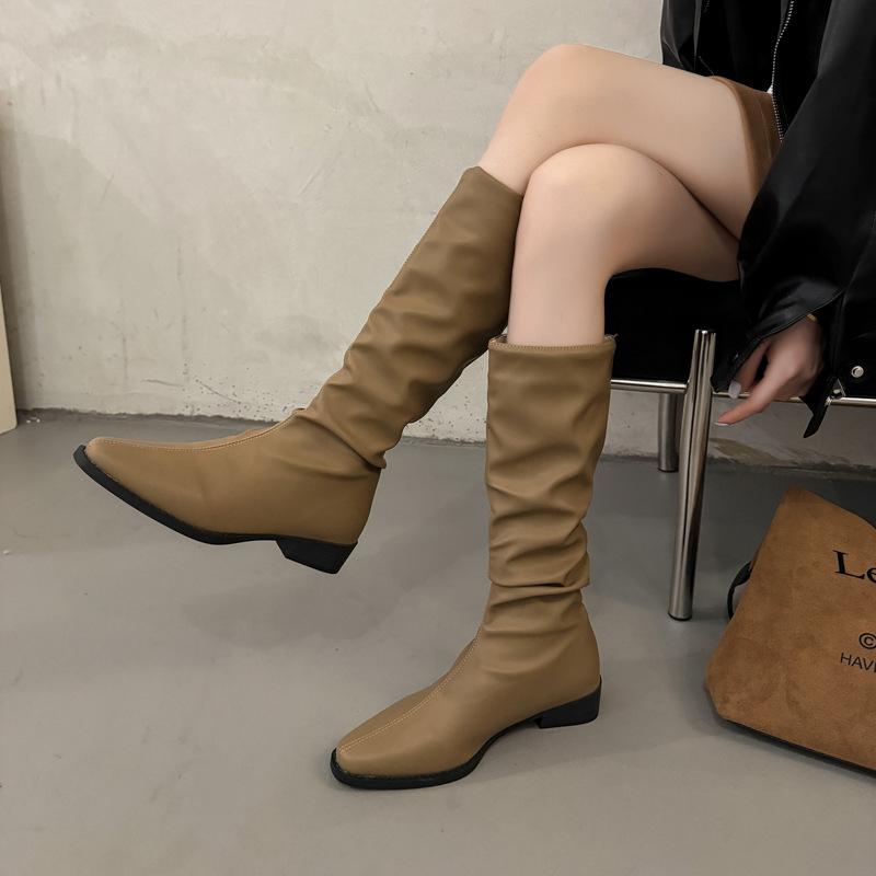 Pile boots women's boots 2025 new spring and autumn retro but knee thin solid color thick heel knight boots