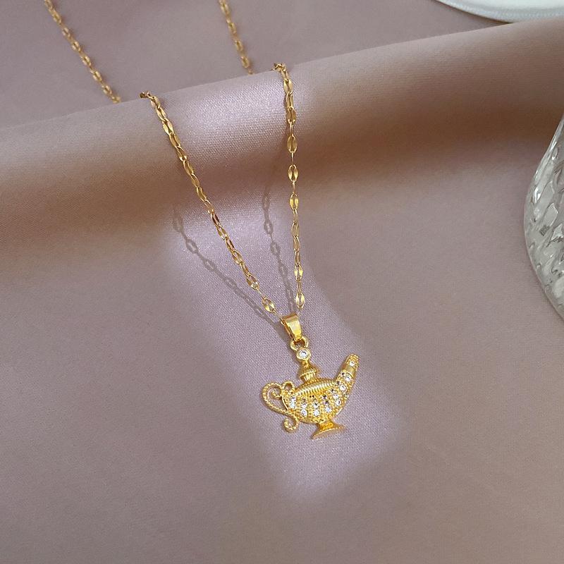 Titanium Steel Luxury Zirconia Necklace with Electroplated Gold Pendant in Fresh INS Style.