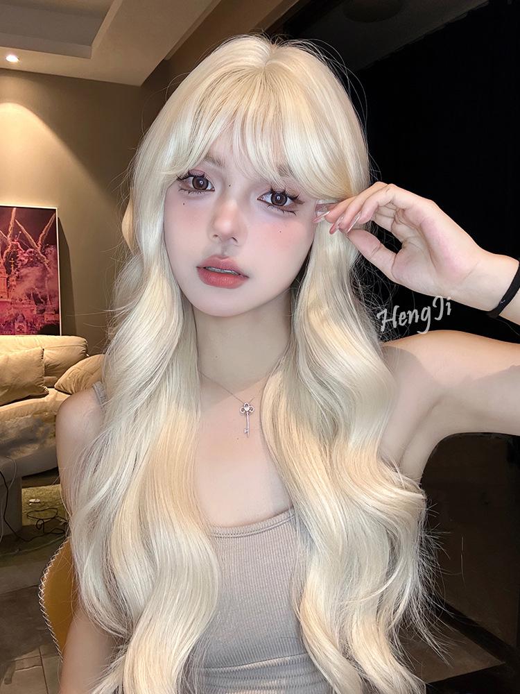 Women s Long Curly Wig with Middle Part Bangs in Light Gold and White.