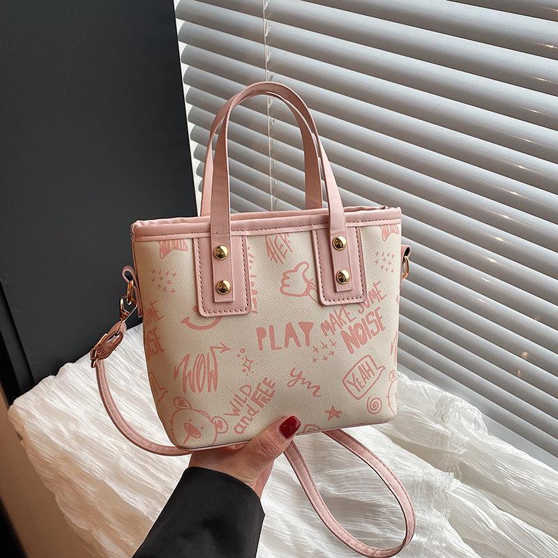 Fashionable and Trendy Printed Shoulder Bag for Women's New Simple Hand To Wear Tote Bag for College Students' Commuting Class Bag
