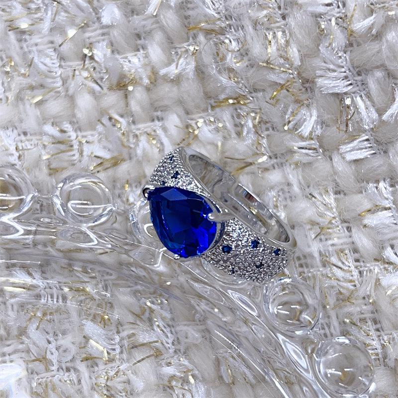 Elegant Adjustable Sapphire-Colored Gemstone Ring for Women with Micro-Paved Zircon Diamonds - Versatile and Stylish Gift.