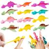 Dinosaures Lanceurs de Doigts Caoutchouc Collant Dino Pâques Gag Drôle Cadeaux Souvenirs de Fête Remplisseurs d'Œufs pour Enfants Garçons Filles