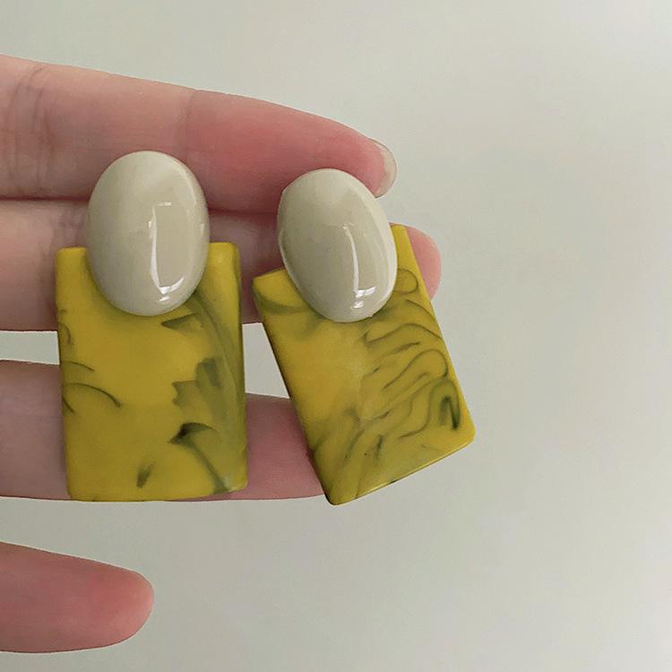 

Шикарные зеленые серьги с геометрической инкрустацией в стиле ретро для любителей современного дизайна зелёный