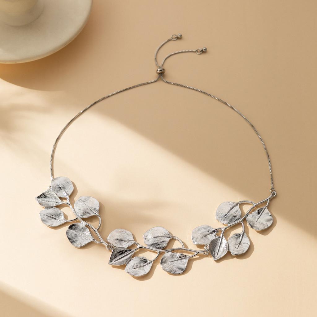 Elegant Leaf Design Alloy Earrings For Fashion Forward Women In Gold And Silver Colors