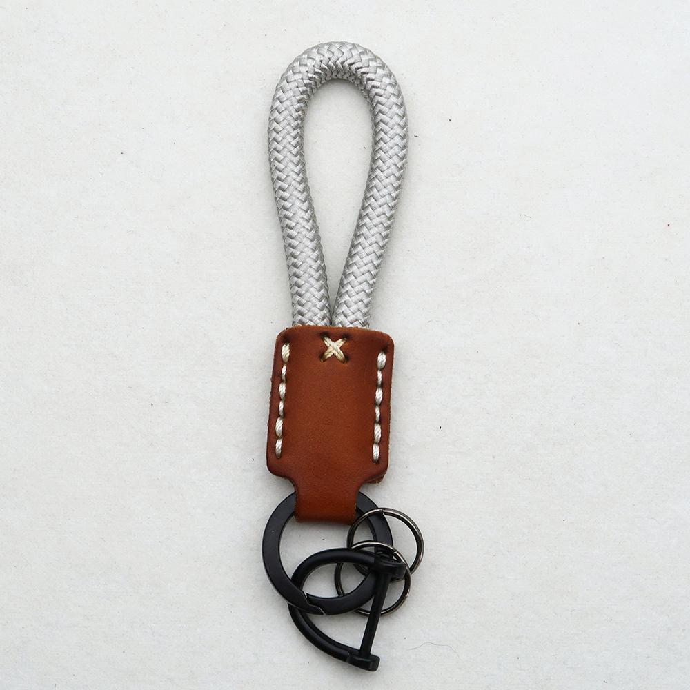 Hand-Woven Cowhide Leather Keychain Pendant with Logo Embossing - High-Quality Anti-Lost Car Lanyard