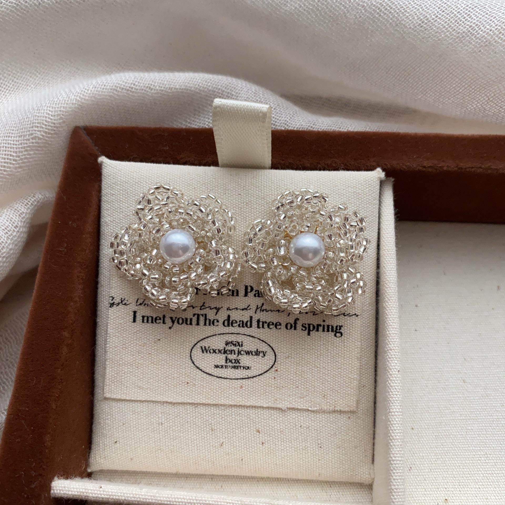 Beaded flower pearl earrings holiday style new stud earrings niche design temperament versatile and elegant