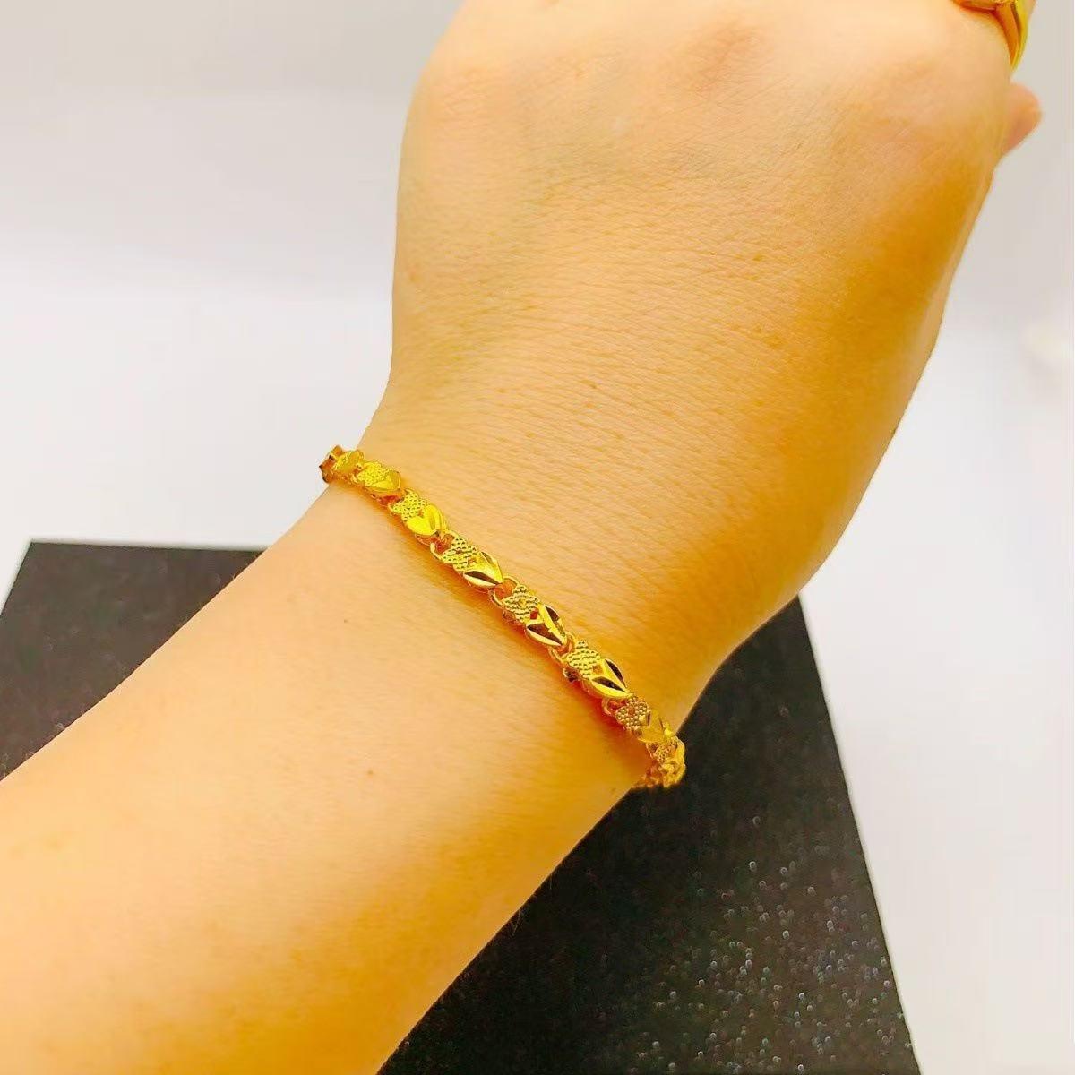 

Золотой браслет с сердцем и четырехлистным клевером для женщин - Элегантные нишевые дизайнерские украшения