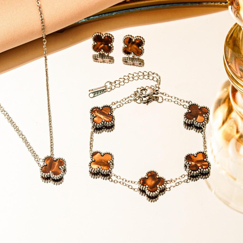 Set 3 pezzi collana bracciale orecchini quadrifoglio double-face in acciaio al titanio