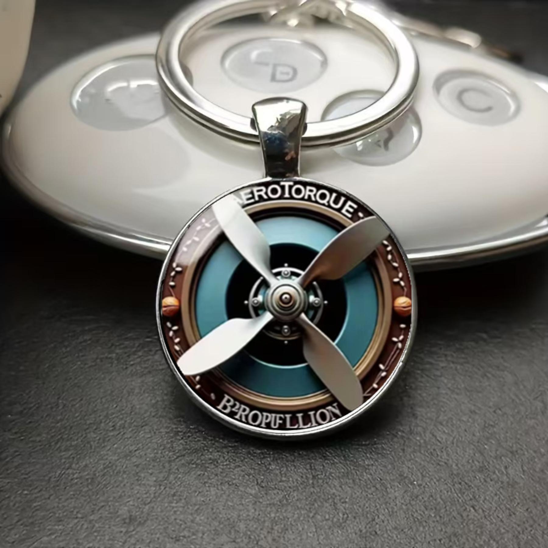 

Round glass alloy keychain with airplane design One Size
