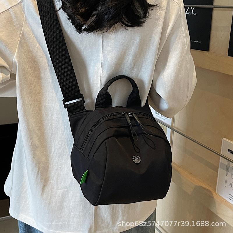 Japan and South Korea 2025 new women's bags fashion casual nylon bags lightweight women's travel bags niche design messenger bags
