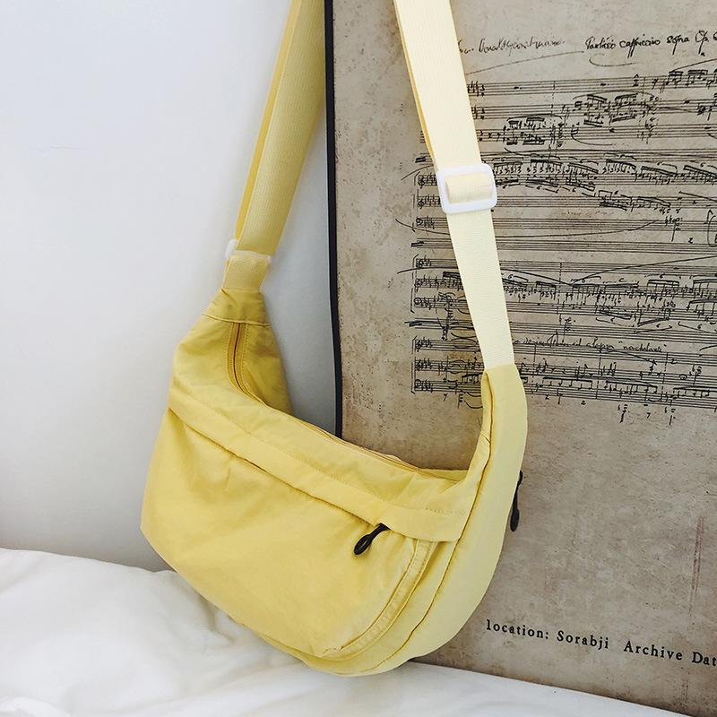 Casual crossbody bag girls lightweight shoulder canvas bag waterproof commuting solid color versatile nylon dumpling bag for men