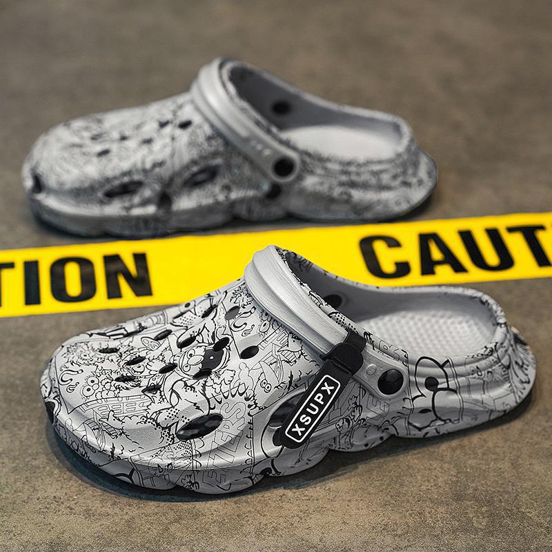 

Тапочки Баотоу мужские новые летние носки нескользящие сандалии с большой головой мужские ощущение дерьма приморский пляж дырявые туфли 44 (standard sneaker size) серый