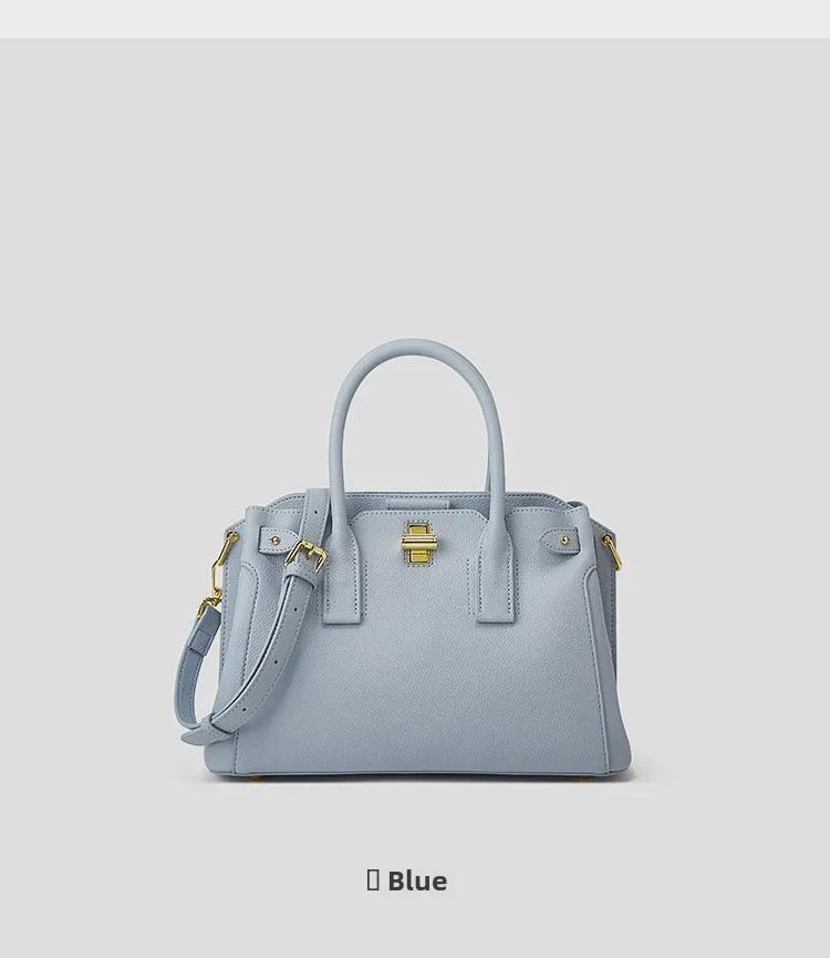Chic Women's Tote Bag: Niche Design, Hand-Held Platinum, Large-Capacity, Fashionable Messenger Bag.