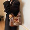 Fashion and leisure large-capacity backpack women's 2025 new spring and summer cartoon embroidery high-end niche design