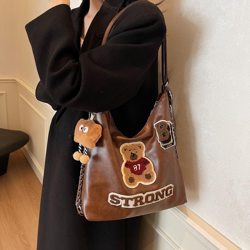 Fashion and leisure large-capacity backpack women's 2025 new spring and summer cartoon embroidery high-end niche design