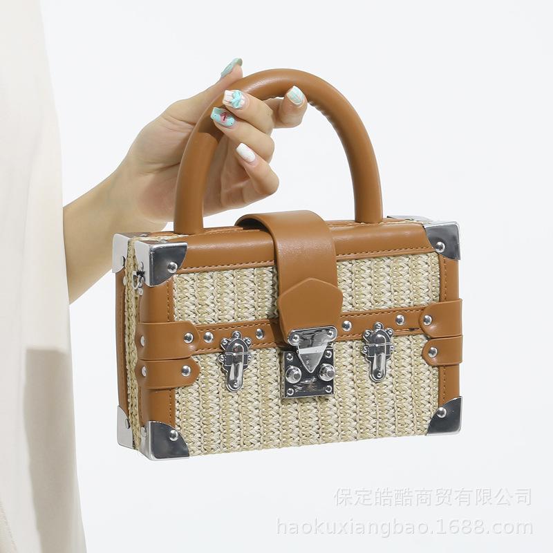 Woven straw bag women's 2025 new niche design messenger bag summer versatile high-end portable small square bag