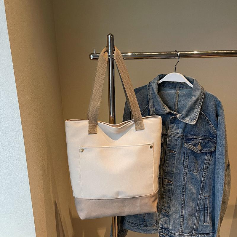 

Women s bag 2025 new Korean version single shoulder ins canvas bag fashionable simple large capacity women s portable tote bag