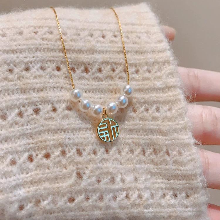 Fu character pearl necklace women's light luxury niche design sweater chain collarbone chain year neck chain
