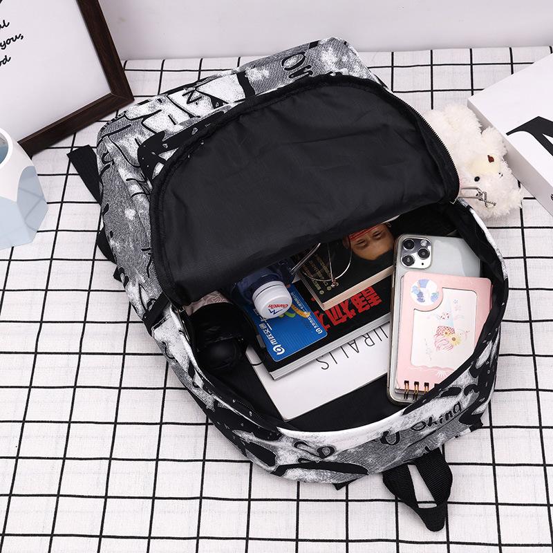 Sac à dos scolaire sac à dos mode et simple sac à dos pour élèves du collège et du lycée japonais version coréenne sac à dos Mori sac à dos tendance graffiti