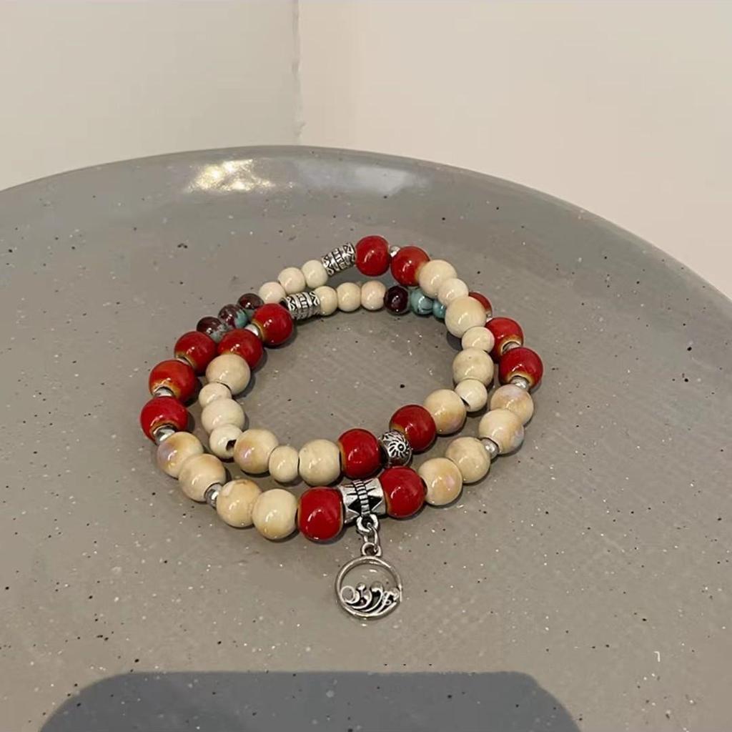 Keramikperlenarmband für Damen, Ethno- und Exotik-Stil, elastisches Seil, chinesisch inspiriertes Design