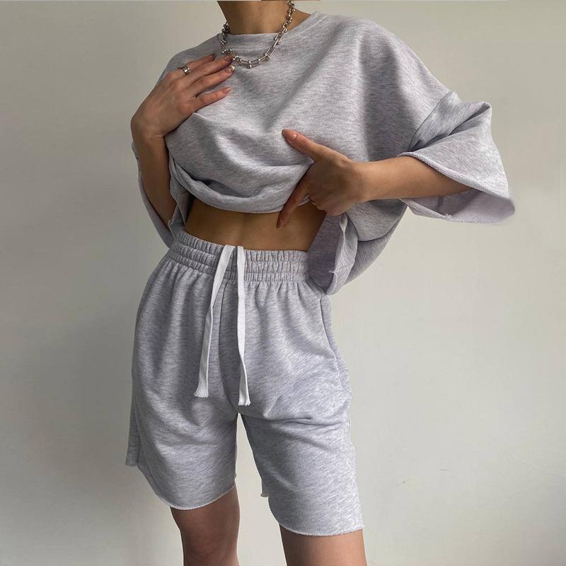 European and American New Casual Women's Suit Solid Color Half-sleeved Round Neck Loose Short-sleeved Tether Shorts Two-piece Set