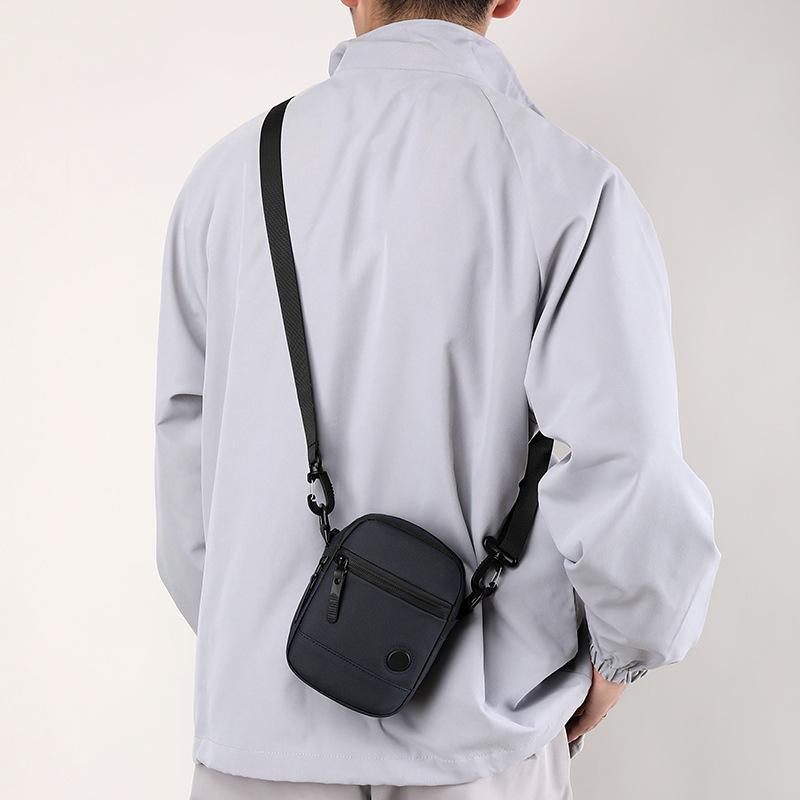 New men's messenger bag outdoor travel mobile phone bag men's small square bag casual large capacity shoulder light luxury
