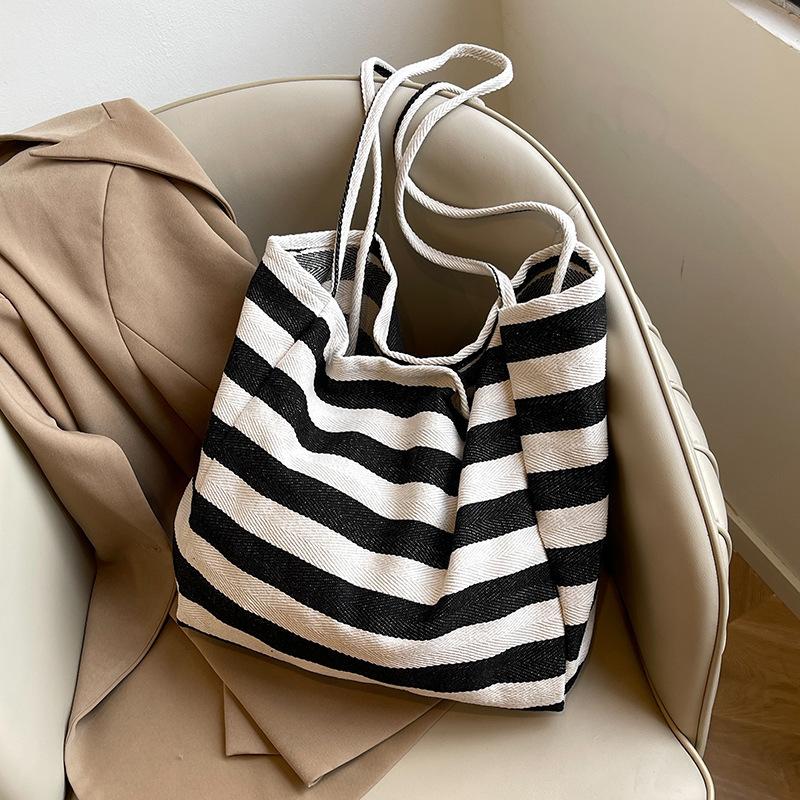 Korean version of casual art canvas bag ins fashion contrasting handbag Internet celebrity small fresh striped shoulder tote bag