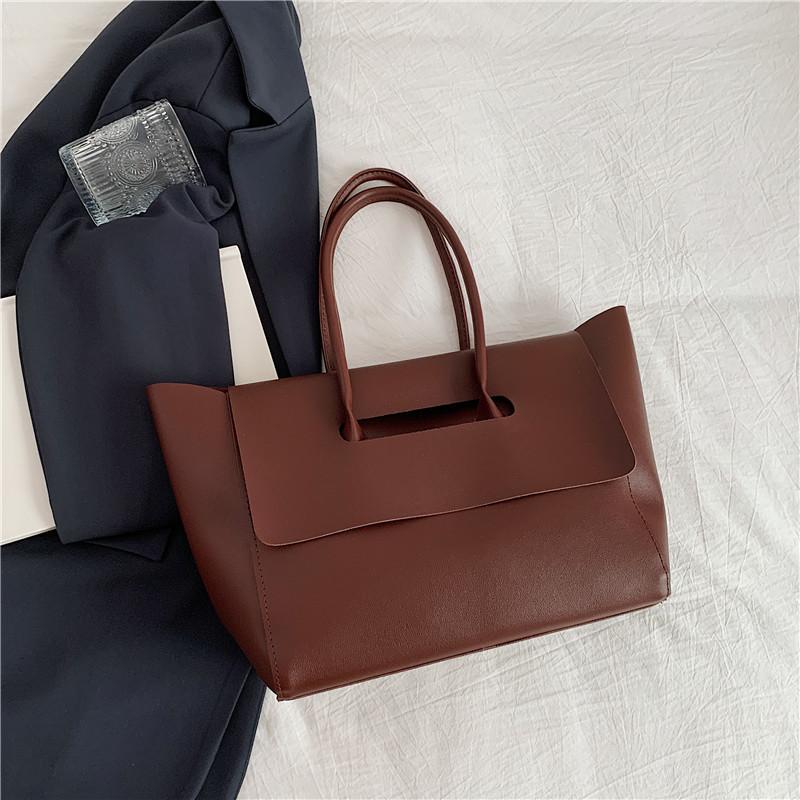 

Large capacity bag women s new high-end large bag retro portable tote bag niche texture shoulder bag tide темно-коричневого кольору