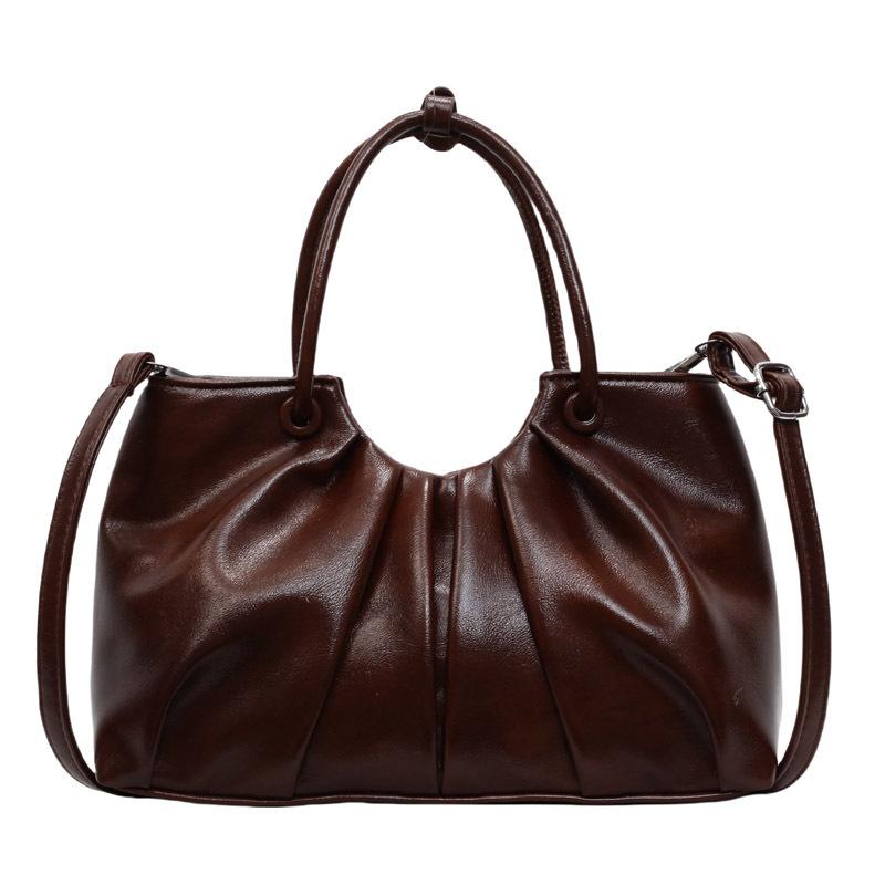 

Корейская версия нишевой дизайнерской плиссированной сумки в иностранном стиле, женская универсальная сумка-мессенджер для通勤 из масляной вощеной кожи с чувством стиля коричневый