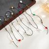 Retro Handmade Y-shaped Necklace with Black Wax Cord, Colored Stones, and Pearls - Fashionable European and American Layered Clavicle Chain.