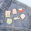 Versatile Alloy Enamel Brooch: Airplane, Hot Air Balloon, and Suitcase Design.