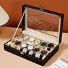 Luxuriöse schwarze Uhrenbox aus Kunstleder mit Glasdeckel, Samt gefüttert, abschließbarer Klappdeckel, rechteckige Vitrine für 12 Uhren