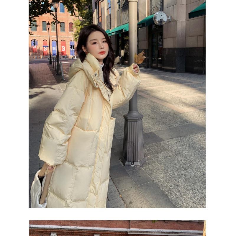 Light yellow down jacket, women's mid length, 2023 winter new style, hooded, thickened, knee high, small jacket
