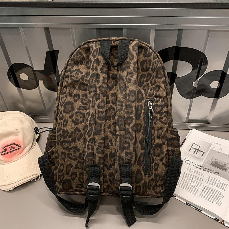 New backpack personalized leopard print versatile portable fashion middle school student schoolbag women's high-end niche backpack