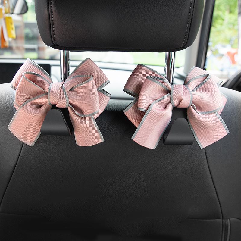 

2 шт. универсальных органайзера для спинок сидений, симпатичные крючки для сумок на подголовники автомобиля с бантом, прочные и долговечные крючки для хранения на задних сиденьях автомобиля