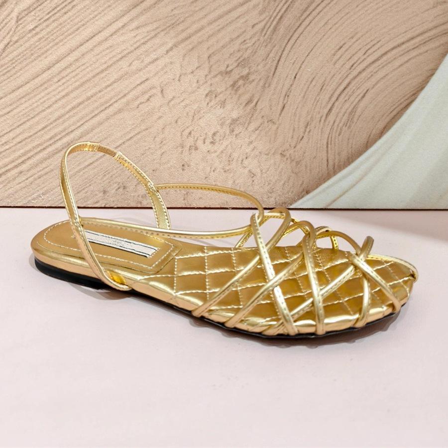 Sheepskin~ Zhong Chuxi has the same alkaline water knot woven open-toed thin strap gold flat-bottomed Roman sandals for women's summer wear