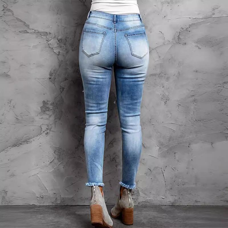 Spring and Autumn new ripped leopard print patch slim and thin mid-waist washed jeans women