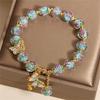 Nature Glass Bead Bracelet Adorned with Butterfly Pendant and Rose Garden Charm for All Day Comfort and Elegant Styles