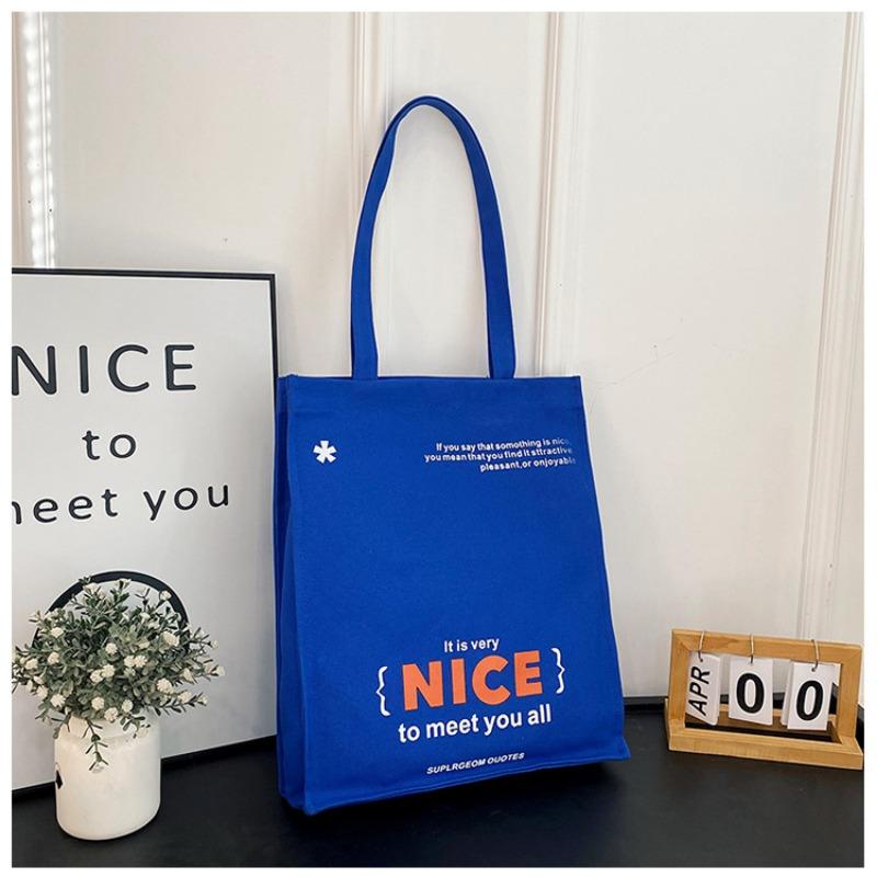 Modieuze draagtas Nieuwe vrouwelijke student make-uptas Canvas tas Dagelijkse pendeltas Grote capaciteit okseltas