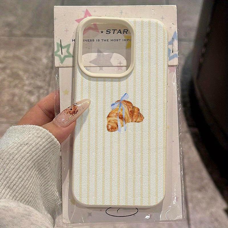 A Striped Croissant-Patterned Phone Case with Lychee Texture, Suitable for iPhone 17, 16, 15, Plus, Pro, Max Series Phones — Can Be Used as a Gift