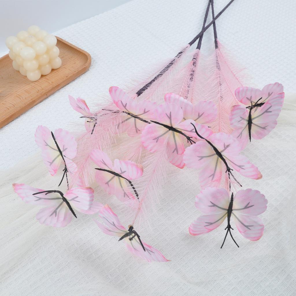 An artificial butterfly branch used for weddings, family offices, parties, decorating vases, and floral arrangements