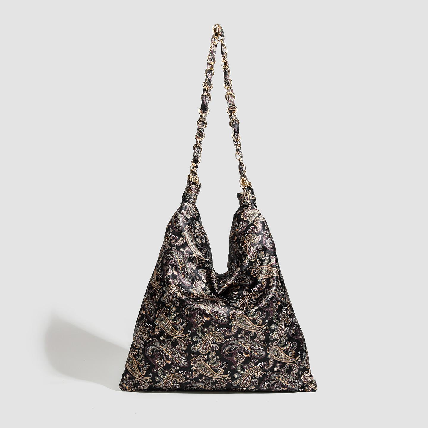 

Vintage silk scarf tote bag cashew pattern shoulder armpit bag women s chain splicing silk satin bag large-capacity shopping bag темно-коричневого