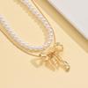 Elegant Faux Pearl & Metal Bow Pendant Necklace for Women