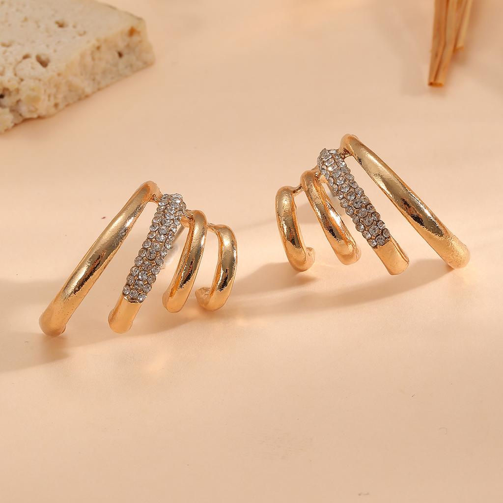 Exaggerated high-end multi-layer claw inlaid antique style earrings with niche design for women's fashionable earrings