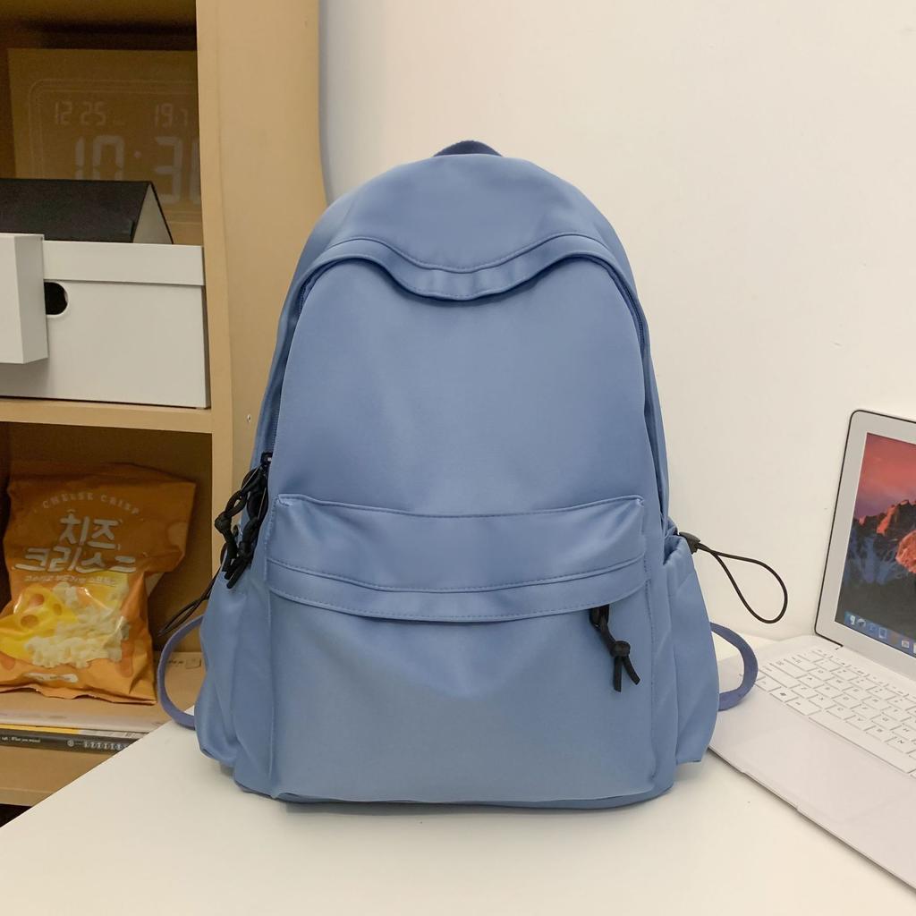 Japanische Schultasche für Studentinnen, koreanische Version, große Kapazität, einfacher einfarbiger Rucksack für Jungen der Unterstufe.