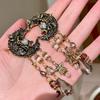 Pendientes de botón Vintage de Luna Dorada con Ángel y Borla de Cristal con Detalles de Esmalte