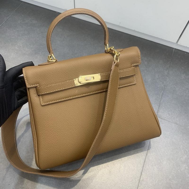 2026 nova bolsa de couro togo com alça larga para ombro, bolsa de mão de couro bovino de primeira camada, bolsa feminina original para ombro único e transversal