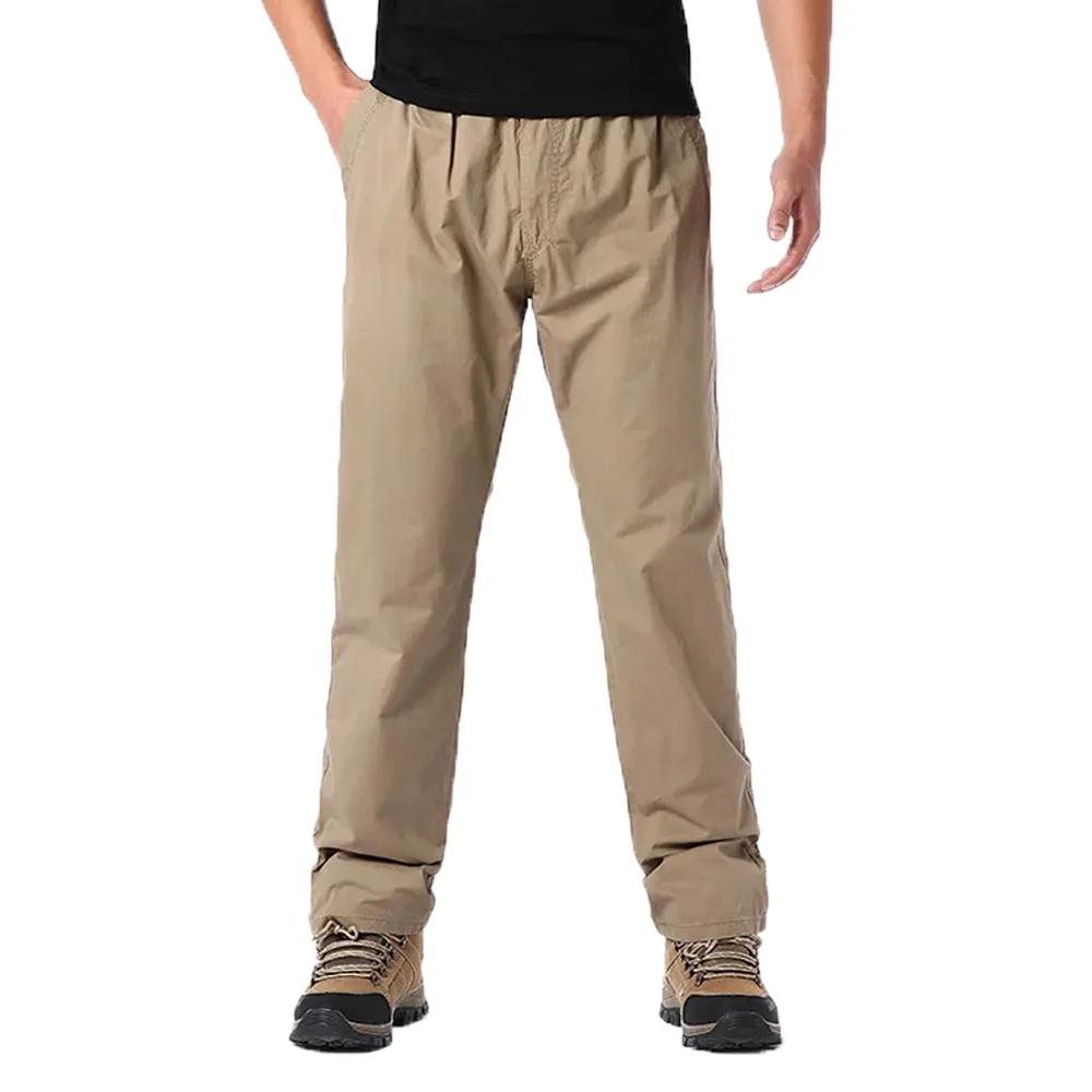 Wiosenne jesienne modne spodnie casualowe dla mężczyzn bawełniane spodnie cargo w jednolitym kolorze z elastyczną talią proste nogawki streetwear męskie spodnie joggers