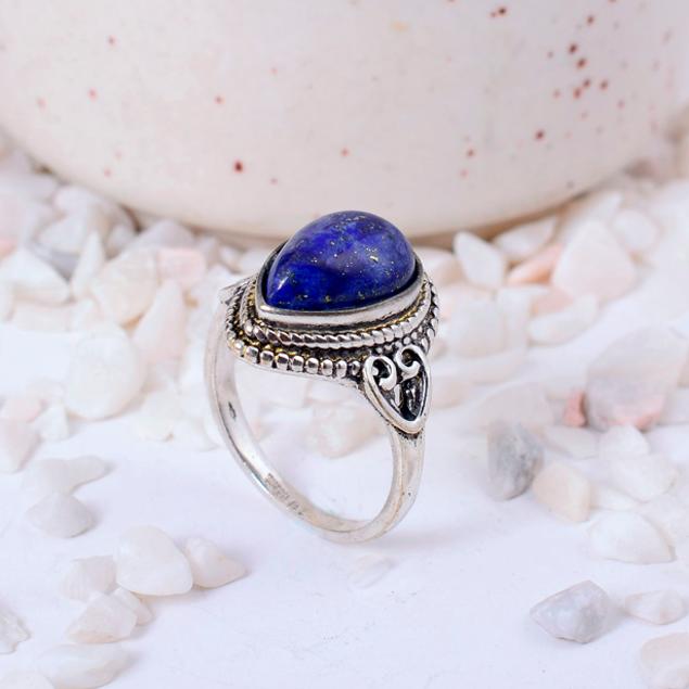 

Handcrafted Silver-Toned Ring with a Teardrop Lapis Lazuli Gemstone and Ornate Scrollwork Detail 3 срібний